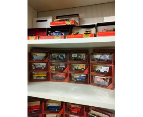 Shelf of matchbox yesteryear advertising van models. 