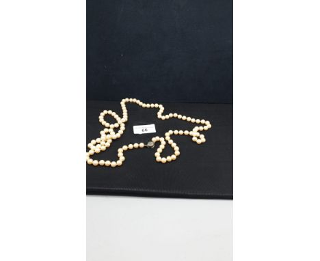 Good quality vintage faux pearl necklace with stone set clasp. 