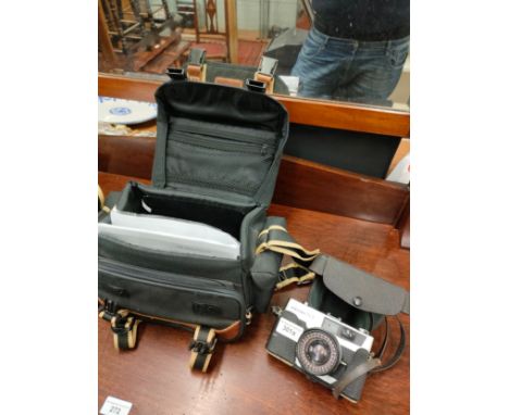 Petri 7s 11 camera with bag etc . 