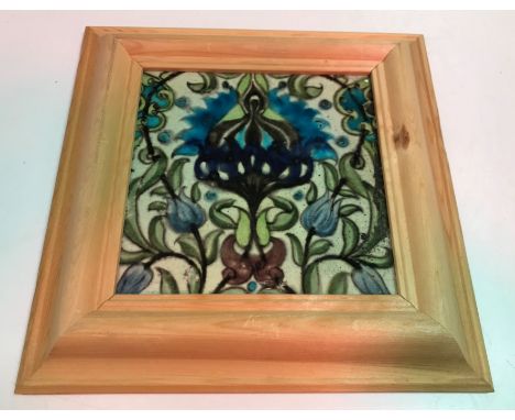 A William de Morgan Sands End Pottery Persian flower tile bearing impressed factory mark to back 15 cm square together with t