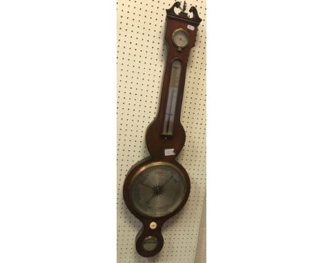 A 19th Century mahogany banjo barometer thermometer with silvered dial and alcohol thermometer (un-named), 96.5 cm high