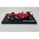 Michael Schumacher-Signed 1:18th Scale Ferrari F2004 Model in a Display Cabinet
