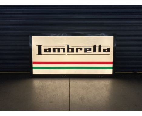 A large 'Lambretta' homage illuminated sign, with the iconic 'Lambretta' script and badge. Offered without Reserve. The sign 