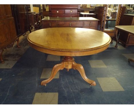 A Mahogany Snap Top Loo Table on Carved Tripod Support