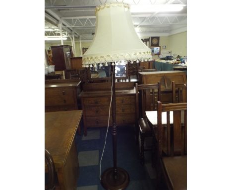 An Oak Standard Lamp