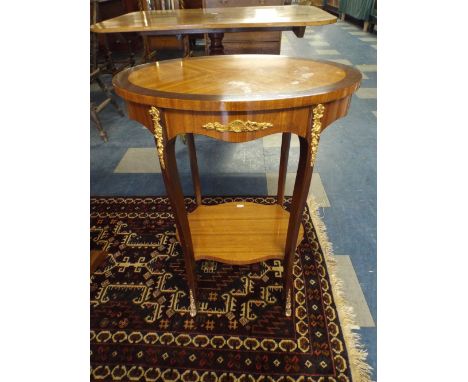 A French Style Occasional Table with Ormolu Mounts and Stretcher Shelf 