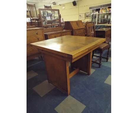 A Light Oak Draw Leaf Dining Table 