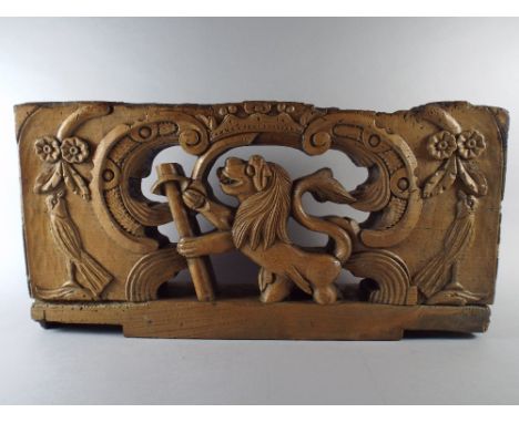 An Early Pierced and Carved Wooden Panel Depicting Lion, Birds and Flowers. 56cm Wide,18.5cm High, 8.5cm Deep