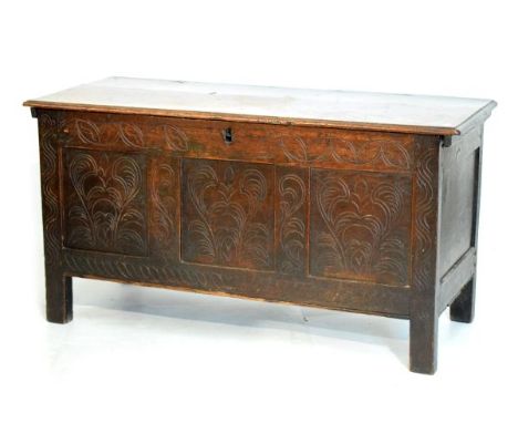 18th Century oak coffer having a shallow carved triple panel front   Condition: 