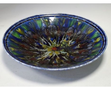 Poole Studio range shallow bowl having multi coloured 'splatter' decoration on a blue/green ground, 35cm diameter   Condition