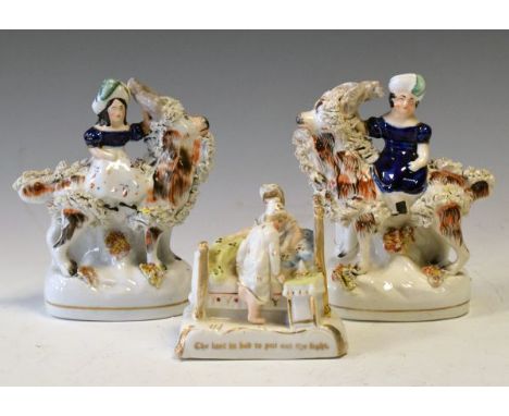 Pair of 19th Century Staffordshire pottery figures, depicting The Princess Royal and the Prince of Wales seated on the back o
