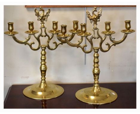 Pair of large 20th Century cast brass four branch candelabra, each standing on a knopped stem and circular foot and with cent