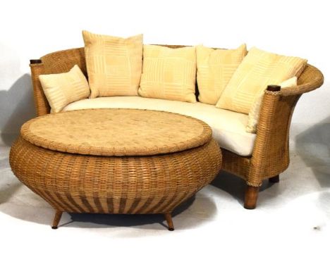 Large cane and seagrass conservatory settee of tub-back design with curved seat, together with a large tile-top occasional ta