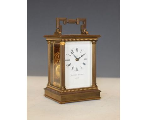 Matthew Norman brass cased carriage clock, the dial with Roman numerals   Condition: 
