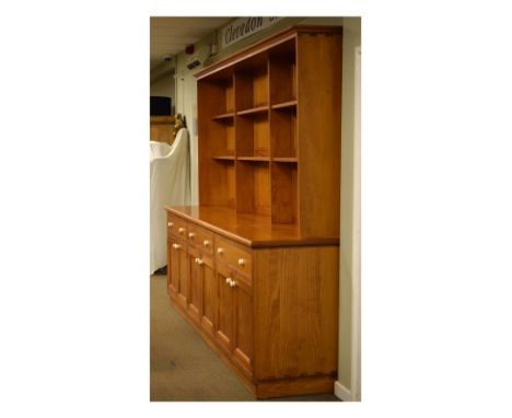 Large 20th Century high dresser, the upper stage having three banks of two shelves with fielded panelled back, the lower stag