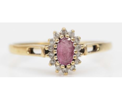 A 9ct gold ruby and diamond cluster ring, O 1/2, 1.4gm