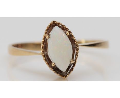 A 9ct gold mounted navette cabochon cut opal ring, M, 1.2gm