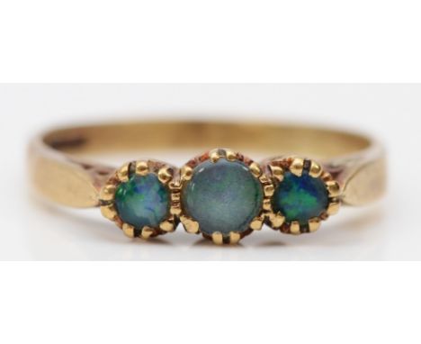 A 9ct gold and opal triplet three stone ring, N 1/2, 1.9gm