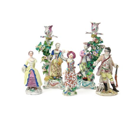 Five Bow figures  c.1760-65, a matched pair of candlestick figures of Summer and Autumn, modelled as a lady with a sheaf of c