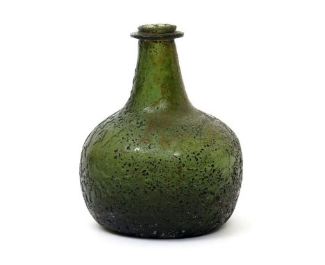 A rare diminutive 'Transitional' shaft and globe to onion wine bottle  c.1680-90, the small squat body of a green tone with s