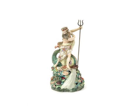 A Derby figure of Neptune  c.1760-65, standing before a colourful dolphin and holding a trident in his left hand, his right c