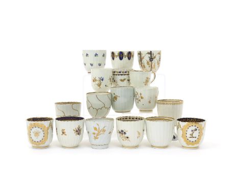 Seventeen Caughley and Worcester coffee cups  c.1780-90, most of fluted form and variously decorated in gilt and mazarin blue
