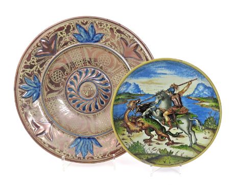 A large Hispano-Moresque charger  19th century, decorated in copper lustre and blue enamel with stylized foliate motifs, with