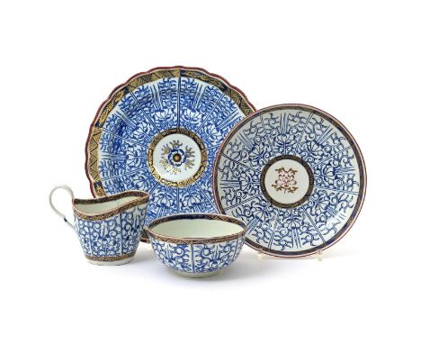 Two Worcester plates  late 18th century, a milk jug and a small bowl, all decorated in the Royal Lily pattern, 24.7cm max. (4