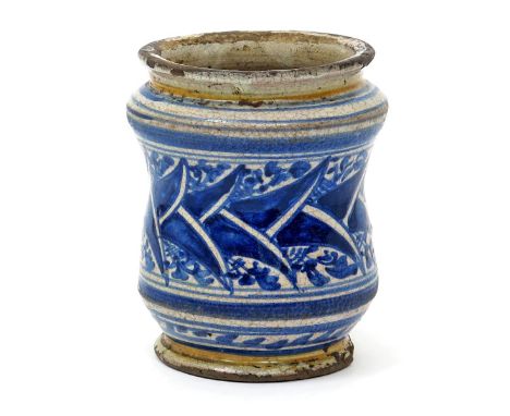 An Italian maiolica small albarello or pill jar  late 16th century, probably Tuscan, the waisted form painted in blue with a 