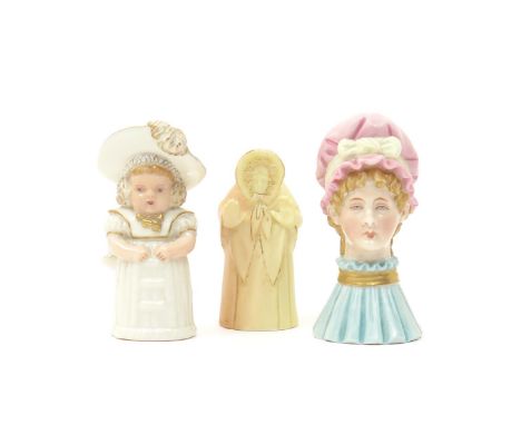 Three Royal Worcester candle snuffers  late 19th century, one a blush porcelain example of Granny Snow, her hands thrown up b
