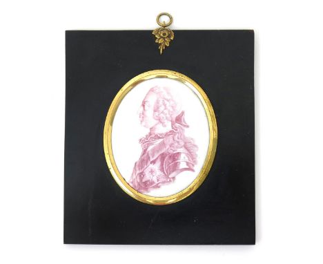 A Battersea enamel oval plaque  c.1761, printed in manganese with a profile portrait of King George III looking to the left, 