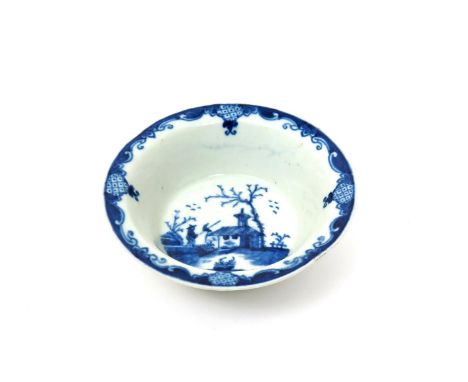 A Worcester blue and white patty pan  c.1757-60, the circular form with deep flared sides, painted with the Bare Tree and Spe