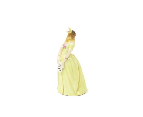 A Royal Worcester candle snuffer  date code for 1919, of Confidence, depicting the singer Jenny Lind as a nightingale, dresse