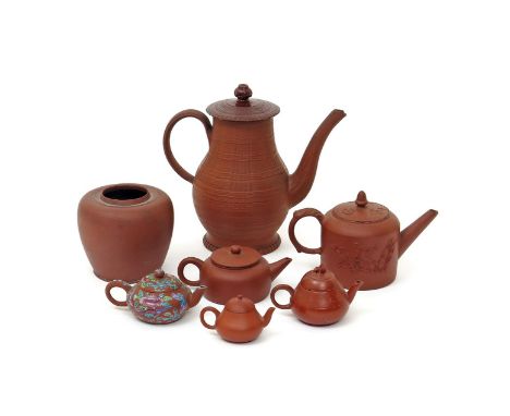 Six redware and Yixing stoneware teapots and covers  18th century and later, English, Chinese and Dutch, one engine turned an