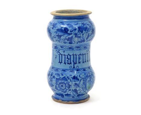 An Italian maiolica berettino albarello  dated 1592, of dumbbell form, painted in blue with a scrolled cartouche inscribed 'd