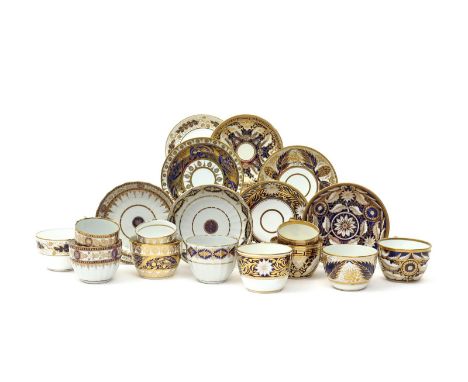 Three Miles Mason porcelain trios and five cups and saucers  c.1800-1805, variously decorated in deep blue and gilt with patt