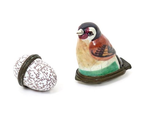 A Staffordshire enamel bonbonnière  c.1780, modelled as a goldfinch, the base inscribed 'Love me and happy be', and an enamel