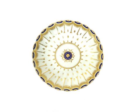 A rare Caughley saucer dish  c.1790, with scallop-edged rim, with fine gilt decoration of husks and chains suspended from a f