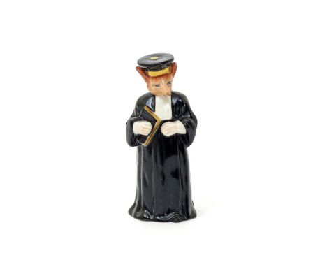 A Royal Worcester candle snuffer  date code for 1903, of Monsieur Reynard, modelled as a fox dressed as a lawyer in black rob