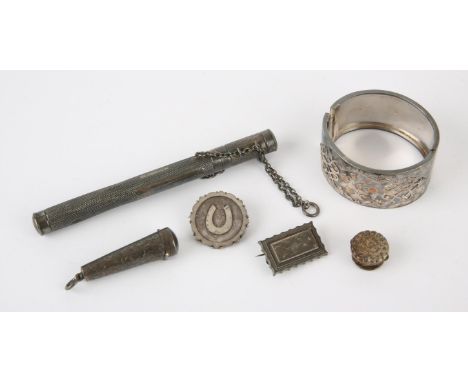 A silver pencil holder by S.Morgan & Co, hallmarked London 1905. an engraved silver clasp bangle, two brooches and a pendant,