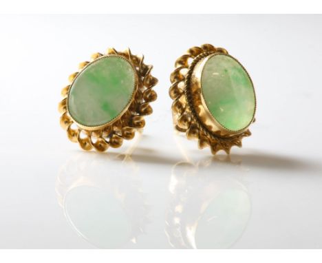 A pair of stamped 9ct yellow gold set earrings with oval jade to centre, post and butterfly fittingsCondition Report:  gross 