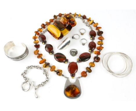 Amber necklace with large pendant set in silver, silver necklace with large agate stones and smaller citrines and garnets, si