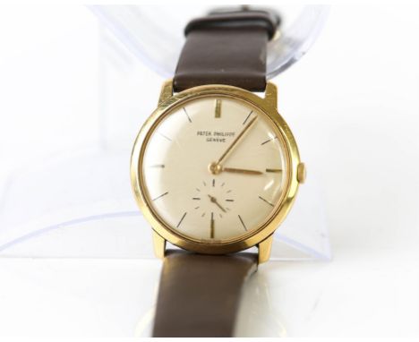 Patek Philippe, a reference 2596, 18ct gold gentlemen's dress watch, the signed dial with gold baton hour markers and subsidi