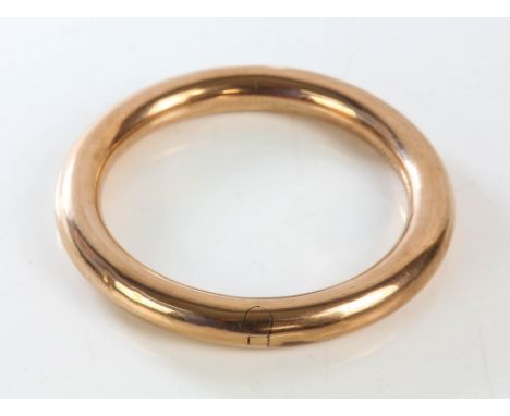 Ladies 9ct rose gold hinged bangle, 8.9mm wide, internal diameter 58mm, 'Dorothy. Aug 31st 1912' written to the insideConditi