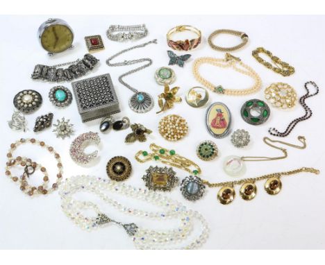 A selection of costume jewellery including, brooches, earrings, necklaces and a Smiths alarm clock, together with a small qua