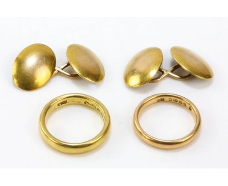 Two rings and a pair of cufflinks, comprising two 22ct gold wedding bands, one hallmarked Birmingham 1925, SIZE k, one hallma