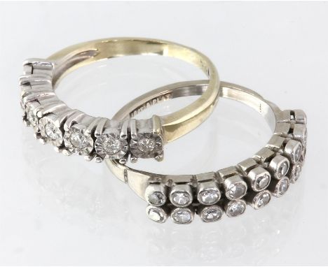 Two diamond set rings, including one single row illusion set 7 stone ring, set in stamped 18ct white metal, ring size K½, wit