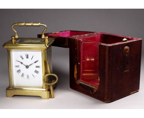 A 20th century carriage timepiece - with a squat corniche case fitted with a white enamel dial set out in Roman numerals, hei
