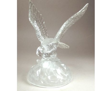 A 20th century lead crystal model of an osprey - in flight with a salmon in its talons, height 20cm.