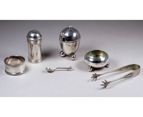 A silver muffin topped pepper - London 1995, John Bull Limited, together with a silver napkin ring, weight 82.7g, also includ